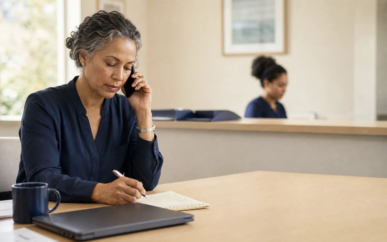 A Baba advocate coordinates follow-up work by phone